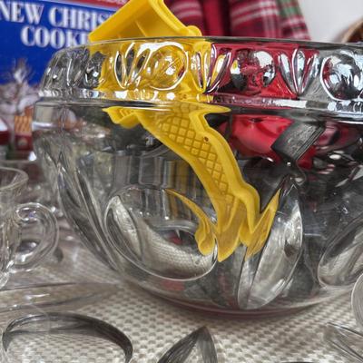LOT 97: Vintage Hull Pottery Gingerbread Man Serving Plate, Crystal Punch Bowl Filled w/Cookie Cutters, Gingerbread Napkin Rings & More