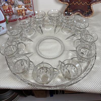 LOT 97: Vintage Hull Pottery Gingerbread Man Serving Plate, Crystal Punch Bowl Filled w/Cookie Cutters, Gingerbread Napkin Rings & More