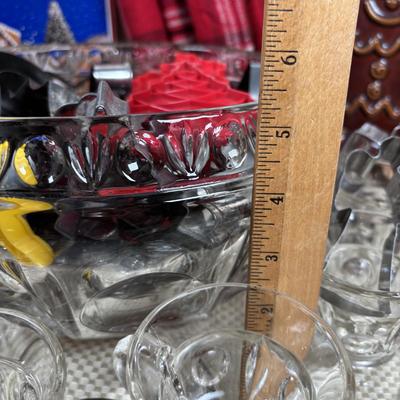 LOT 97: Vintage Hull Pottery Gingerbread Man Serving Plate, Crystal Punch Bowl Filled w/Cookie Cutters, Gingerbread Napkin Rings & More