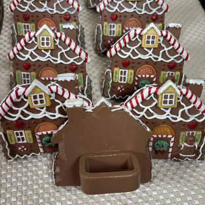 LOT 97: Vintage Hull Pottery Gingerbread Man Serving Plate, Crystal Punch Bowl Filled w/Cookie Cutters, Gingerbread Napkin Rings & More