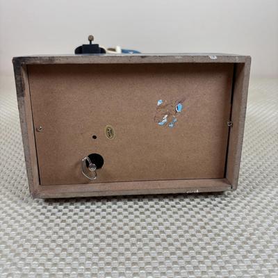 LOT 98: Longaberger Holiday Basket, Princess House Embossed Trio of Star Plates Snowman on Bicycle Music Box, It's a Wonderful Life...