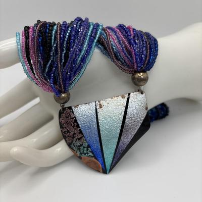 LOT 104: Beaded Necklace Collection Featuring an Art Glass Pendant along with 2 Pair of Dangle Earrings