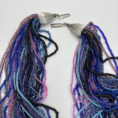 LOT 104: Beaded Necklace Collection Featuring an Art Glass Pendant along with 2 Pair of Dangle Earrings