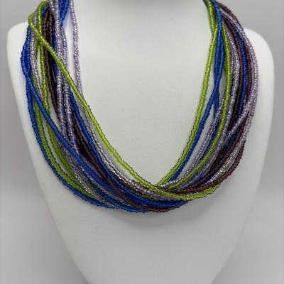 LOT 104: Beaded Necklace Collection Featuring an Art Glass Pendant along with 2 Pair of Dangle Earrings