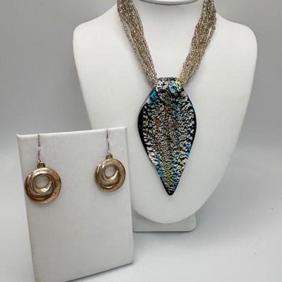 LOT 104: Beaded Necklace Collection Featuring an Art Glass Pendant along with 2 Pair of Dangle Earrings