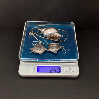 LOT 118: Sterling Silver Jewelry - Dangling Fish Earrings and Shell Pendant Necklace