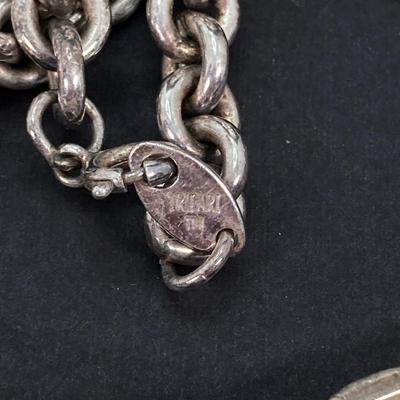 LOT 119: Silver Tone Jewelry Collection - Lci, Napier, Trifari and More