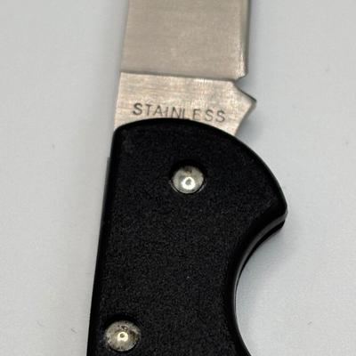 LOT 128: Zippo Maxon Pocket Knife, German Beer Stein and Fishing Coffee Mug