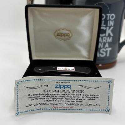 LOT 128: Zippo Maxon Pocket Knife, German Beer Stein and Fishing Coffee Mug