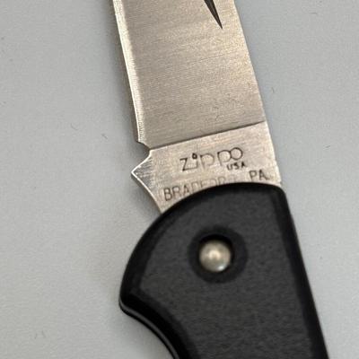 LOT 128: Zippo Maxon Pocket Knife, German Beer Stein and Fishing Coffee Mug