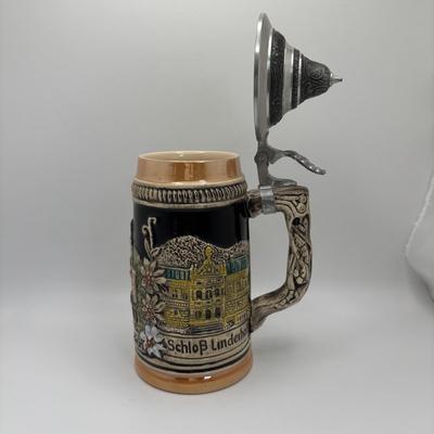 LOT 128: Zippo Maxon Pocket Knife, German Beer Stein and Fishing Coffee Mug