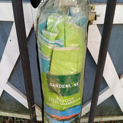 LOT 238: Set of (7) Tiki Torches, 7.5ft Steel Umbrella & Beach Chairs