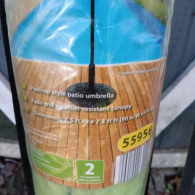 LOT 238: Set of (7) Tiki Torches, 7.5ft Steel Umbrella & Beach Chairs