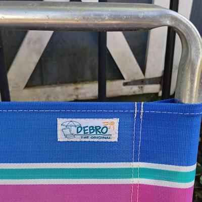 LOT 238: Set of (7) Tiki Torches, 7.5ft Steel Umbrella & Beach Chairs