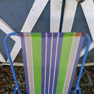 LOT 238: Set of (7) Tiki Torches, 7.5ft Steel Umbrella & Beach Chairs