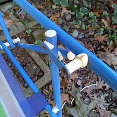 LOT 238: Set of (7) Tiki Torches, 7.5ft Steel Umbrella & Beach Chairs