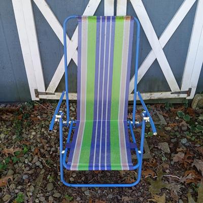 LOT 238: Set of (7) Tiki Torches, 7.5ft Steel Umbrella & Beach Chairs