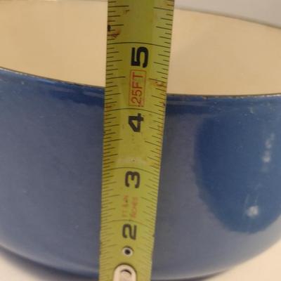 Sale Photo Thumbnail #549: Le Creuset Enameled Cast Iron Dutch Oven with Lid- Size 'E' 4 1/2 Quart Capacity.  Item is used and has some discoloration of interior, but appears to be in good condition.