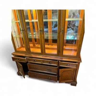 Sale Photo Thumbnail #11: Bassett Furniture  Glass Top China Cabinet.  Lighted Cabinet..   Glass Shelves in upper Cabinet
Approximately 67"X17"X84"   Bottom Section 67"X17"X29.5"  Top Section 64"X14"X55"