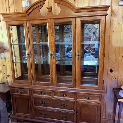 Sale Photo Thumbnail #9: Bassett Furniture  Glass Top China Cabinet.  Lighted Cabinet..   Glass Shelves in upper Cabinet
Approximately 67"X17"X84"   Bottom Section 67"X17"X29.5"  Top Section 64"X14"X55"