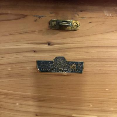 Sale Photo Thumbnail #14: Lakeside Craft Shops Cedar Chest  Sheboygan, Wi
Veneer Peeling on the lid..  Hinge needs to be reattached on the right inside
Approximately 40"X18"X21