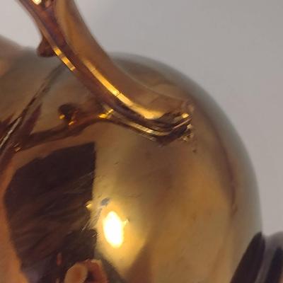 Sale Photo Thumbnail #608: Antique English Lusterware Pitcher- Copper Color with Cream Band- Approx 6" Tall.  Small chip on bottom of handle.