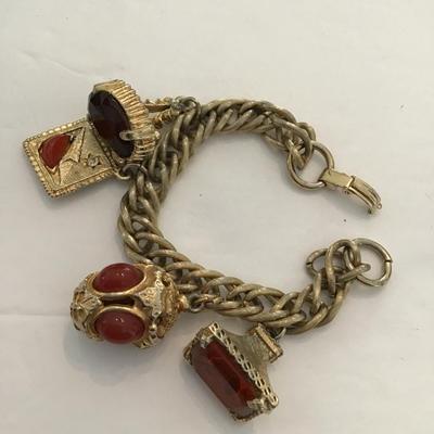 Sale Photo Thumbnail #10: Vintage goldtone, charm bracelet. Please see attached photos.