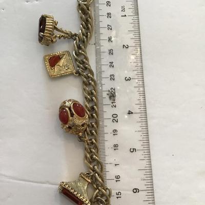 Sale Photo Thumbnail #9: Vintage goldtone, charm bracelet. Please see attached photos.