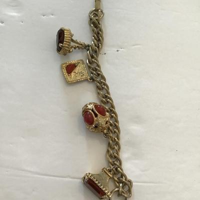 Sale Photo Thumbnail #8: Vintage goldtone, charm bracelet. Please see attached photos.