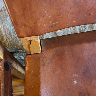 Sale Photo Thumbnail #117: Rustic Barstools with Wood Frame and Leather Seating Surface  Lot Of 5
Approximately Seating 26" High   Back 40" High  Damage to two of the Stools  See Photos