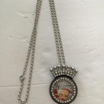 Sale Photo Thumbnail #29: Vintage Santa Claus necklace. Please see attached photos.