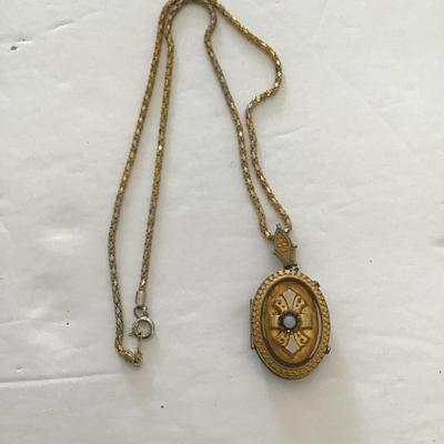 Sale Photo Thumbnail #35: Vintage picture locket has wear blemishes please see attached photos
