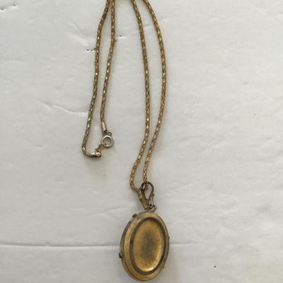 Sale Photo Thumbnail #36: Vintage picture locket has wear blemishes please see attached photos