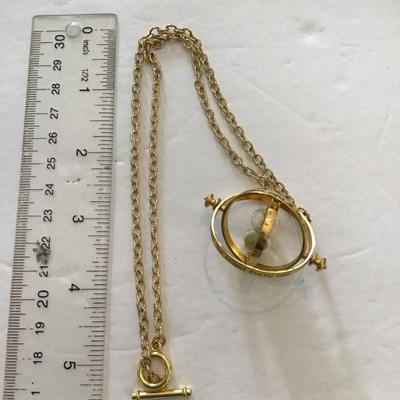 Sale Photo Thumbnail #42: Harry Potter necklace. Please see attached photos.