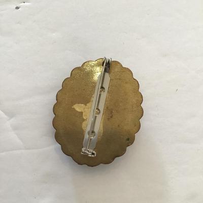 Sale Photo Thumbnail #46: Vintage plastic cameo brooch. Please see attached photos.