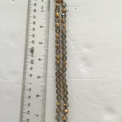 Sale Photo Thumbnail #54: Vintage smoke gold colored crystal bracelet. Please see attached photos.