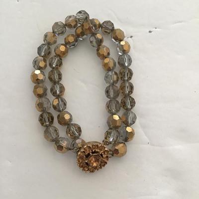 Sale Photo Thumbnail #53: Vintage smoke gold colored crystal bracelet. Please see attached photos.