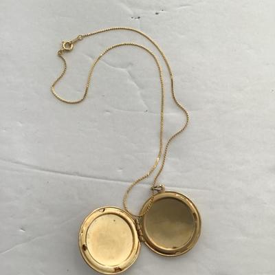Sale Photo Thumbnail #70: Gold tone, necklace and locket Please see attached photos.