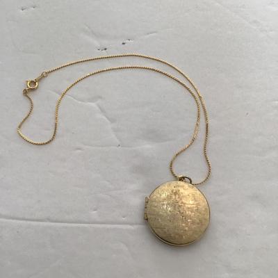 Sale Photo Thumbnail #69: Gold tone, necklace and locket Please see attached photos.