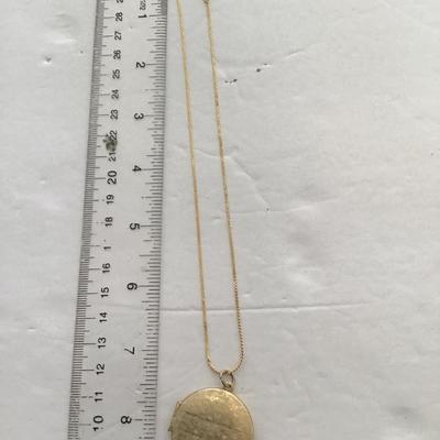 Sale Photo Thumbnail #71: Gold tone, necklace and locket Please see attached photos.