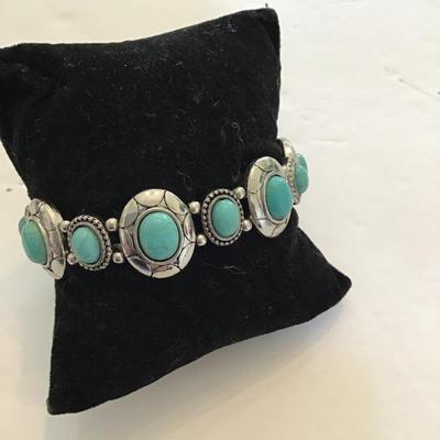 Sale Photo Thumbnail #75: Silvertone faux turquoise stretchy bracelet. Please see attached photos.