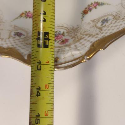 Sale Photo Thumbnail #714: Limoges France Porcelain Gilt Serving Plate- Approx 13 1/4" in Diameter.  Plate stand not included.