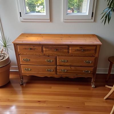 Sale Photo Thumbnail #158: Broyhill Pine Double Dresser With Mirror
Approximately 60"X17"X35"