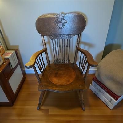 Sale Photo Thumbnail #161: Antique Oak Rocking Chair with a Pressed Back and Leather seating Surface