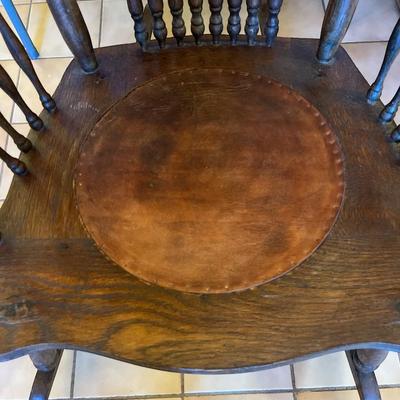 Sale Photo Thumbnail #160: Antique Oak Rocking Chair with a Pressed Back and Leather seating Surface