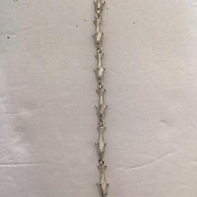 Sale Photo Thumbnail #134: Vintage Silvertone fish bracelet. Please see attached photos.