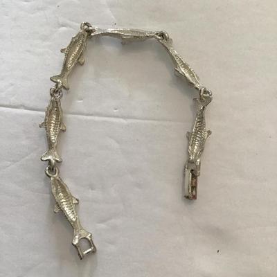 Sale Photo Thumbnail #136: Vintage Silvertone fish bracelet. Please see attached photos.