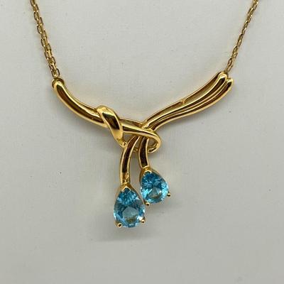 LOT 13: 14K Yellow Gold 17.5" Necklace with Blue Topaz Rhinestone Pendant - 10.8 GTW