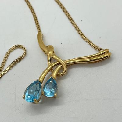 LOT 13: 14K Yellow Gold 17.5" Necklace with Blue Topaz Rhinestone Pendant - 10.8 GTW