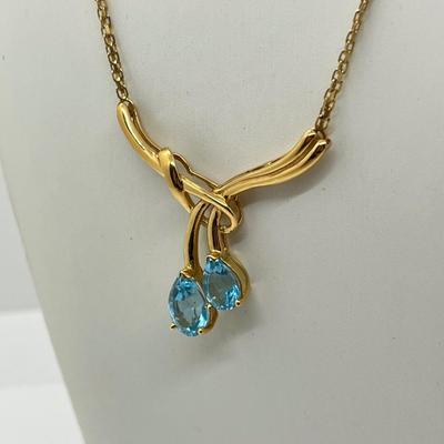 LOT 13: 14K Yellow Gold 17.5" Necklace with Blue Topaz Rhinestone Pendant - 10.8 GTW